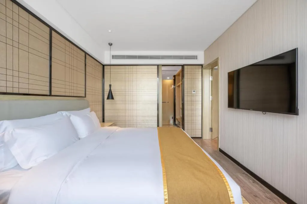 Bed in Echarm Hotel Zibo Gaoqing Zhongcheng Inernational