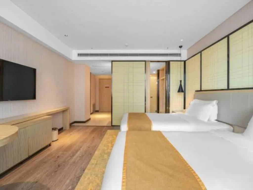 Bed in Echarm Hotel Zibo Gaoqing Zhongcheng Inernational