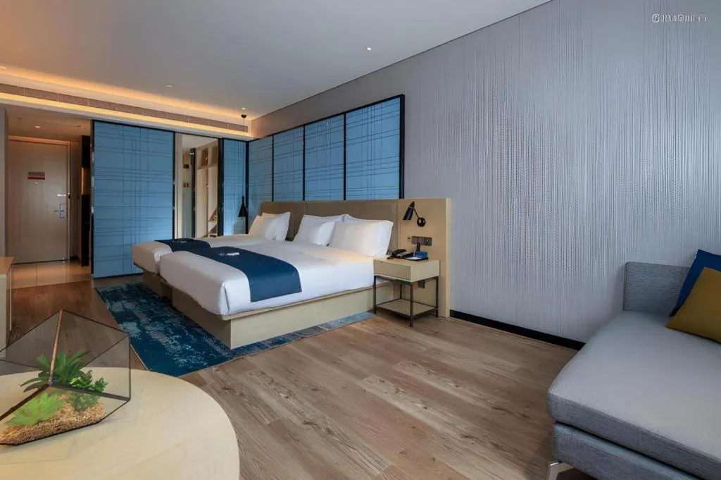 Bed in Echarm Hotel Kunming Railway Station Huancheng South Road Metro Station