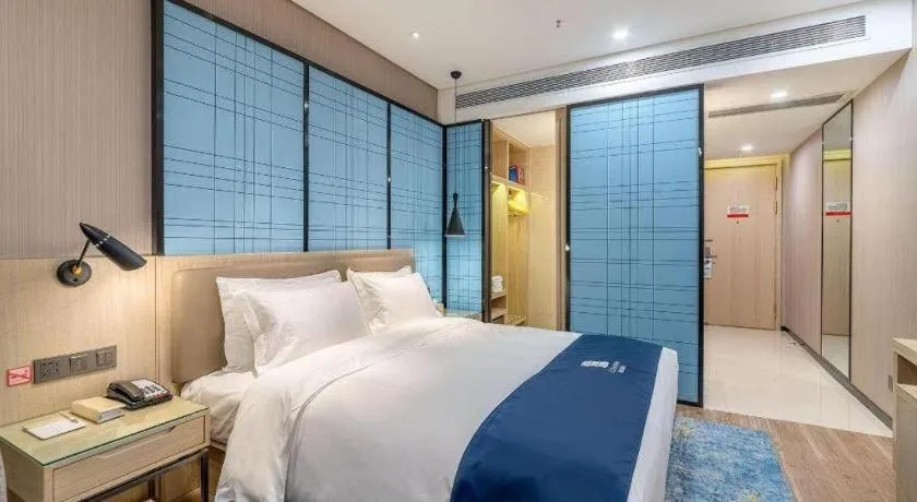 Bed in Echarm Hotel Kunming Railway Station Huancheng South Road Metro Station