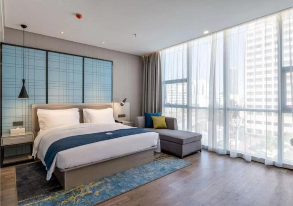 Bed in Echarm Hotel Kunming Railway Station Huancheng South Road Metro Station