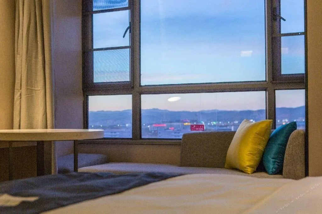 Bed in Echarm Hotel Kunming Railway Station Huancheng South Road Metro Station