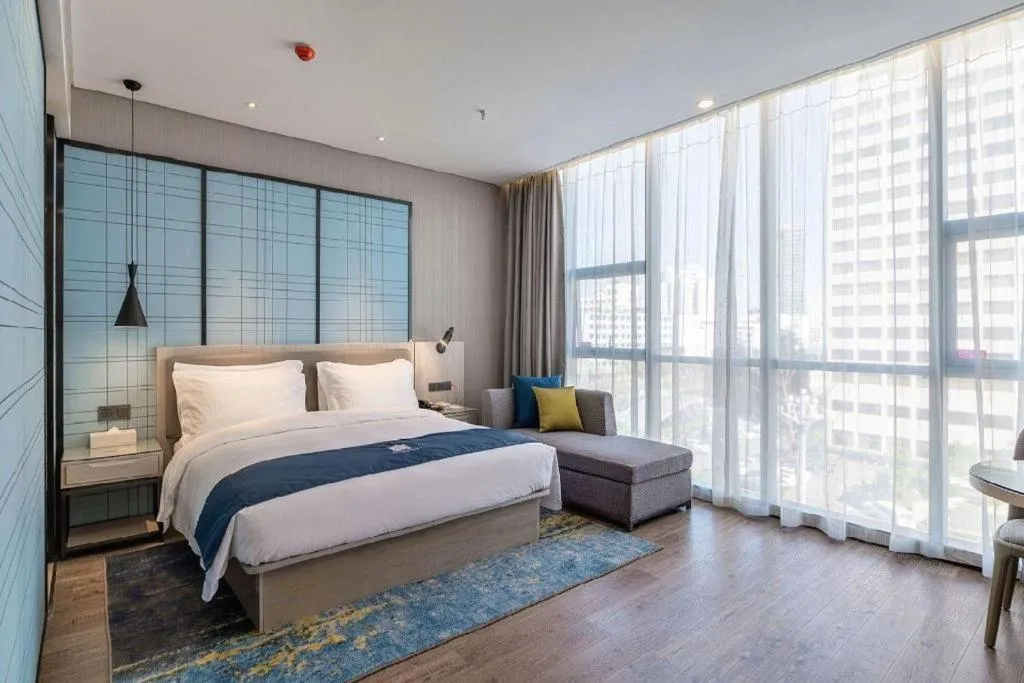 Bed in Echarm Hotel Kunming Railway Station Huancheng South Road Metro Station