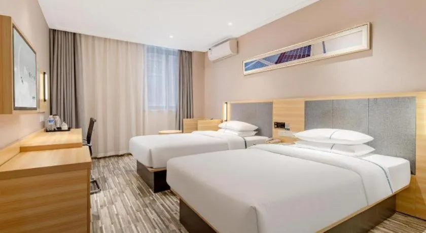 Bed in City Comfort Inn Shanghai International Automobile City Tongji University