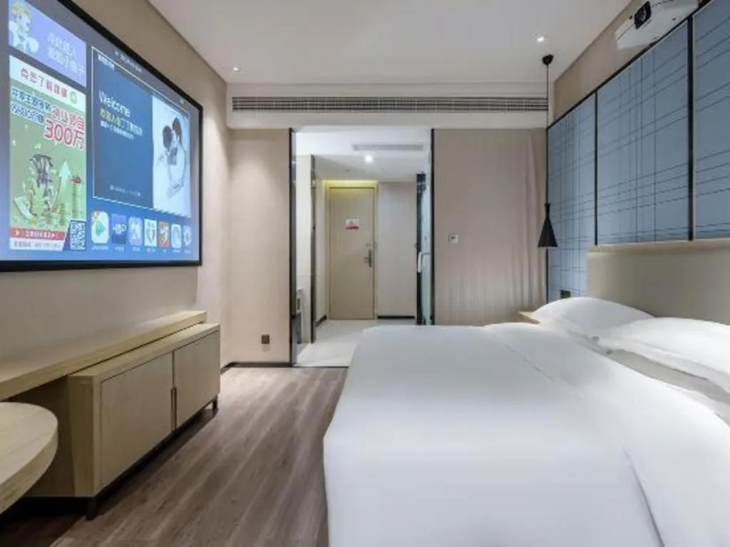Bed in Echarm Hotel Nanning the MixC Exhibition Center Metro Station