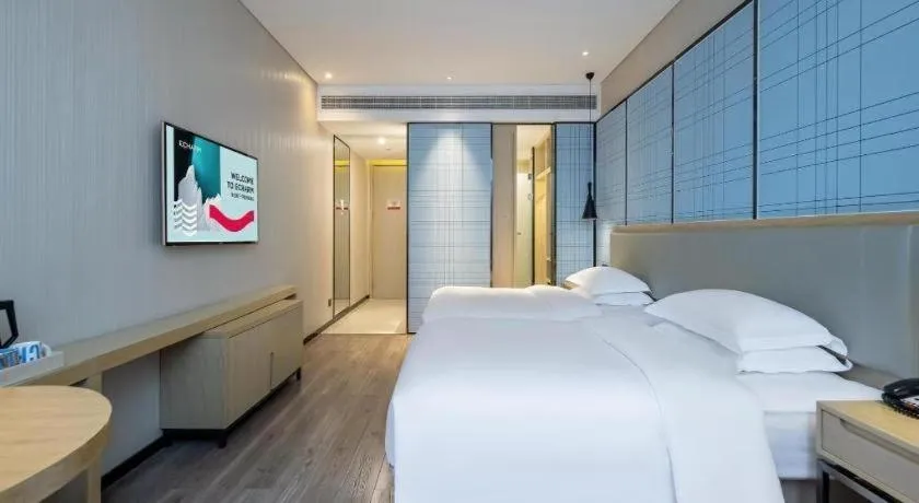 Bed in Echarm Hotel Nanning the MixC Exhibition Center Metro Station