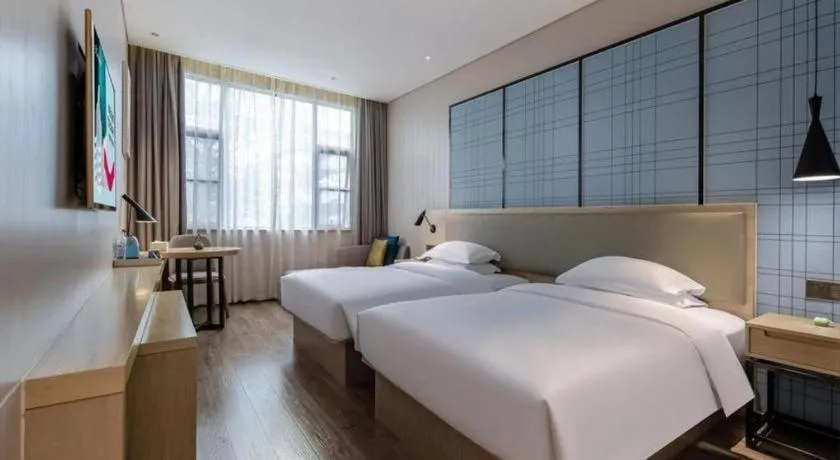 Bed in Echarm Hotel Nanning the MixC Exhibition Center Metro Station