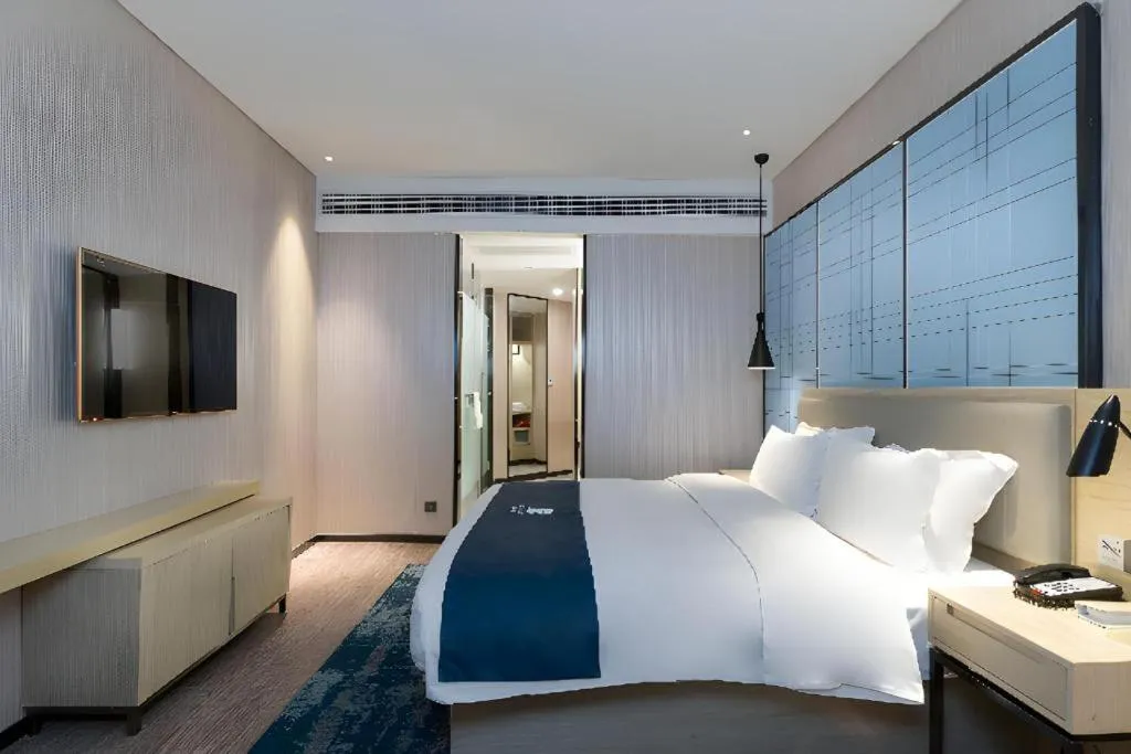 Bed in Echarm Hotel Nanning the MixC Exhibition Center Metro Station