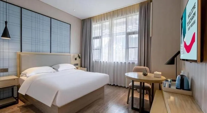 Bed in Echarm Hotel Nanning the MixC Exhibition Center Metro Station