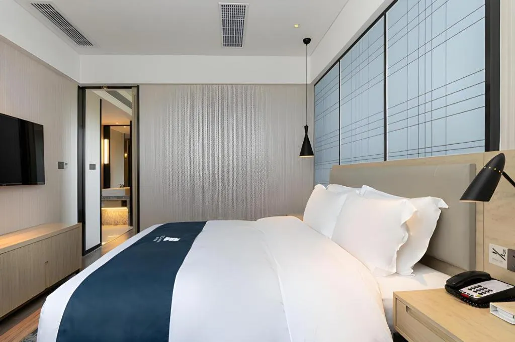 Bed in Echarm Hotel Nanning the MixC Exhibition Center Metro Station