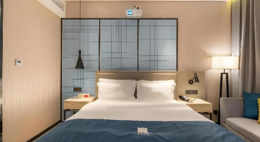 Bed in Echarm Hotel Nanning the MixC Exhibition Center Metro Station