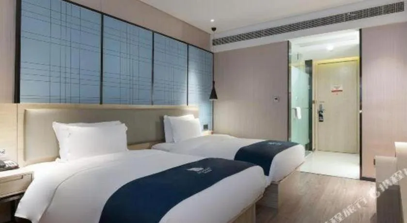 Bed in Echarm Hotel Nanning the MixC Exhibition Center Metro Station