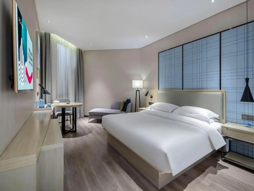 Bed in Echarm Hotel Nanning the MixC Exhibition Center Metro Station