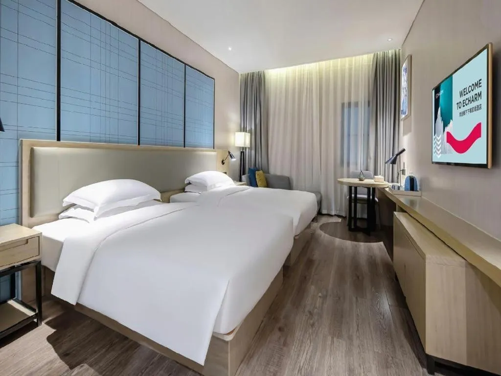 Bed in Echarm Hotel Nanning the MixC Exhibition Center Metro Station