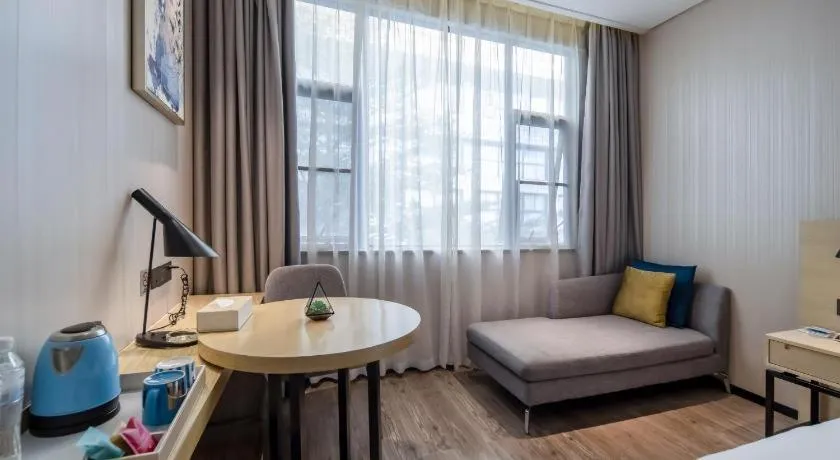 Bed in Echarm Hotel Nanning the MixC Exhibition Center Metro Station