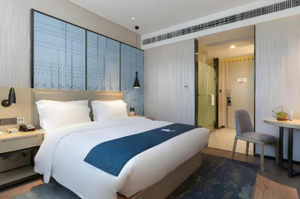 Bed in Echarm Hotel Nanning the MixC Exhibition Center Metro Station