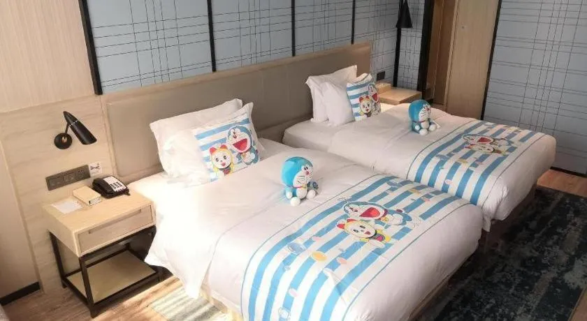 Bed in Echarm Hotel Nanning the MixC Exhibition Center Metro Station