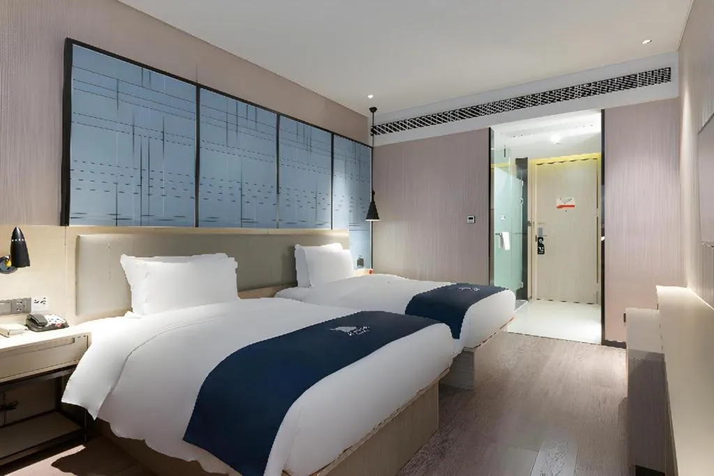 Bed in Echarm Hotel Nanning the MixC Exhibition Center Metro Station