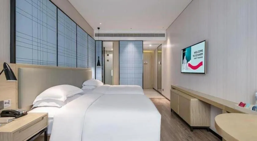 Bed in Echarm Hotel Nanning the MixC Exhibition Center Metro Station