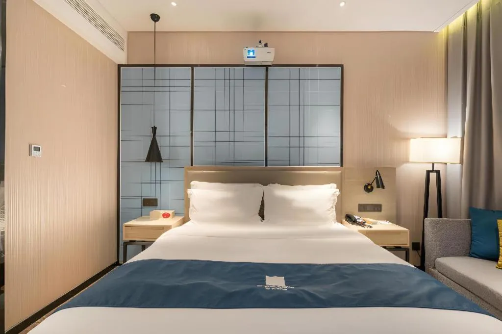 Bed in Echarm Hotel Nanning the MixC Exhibition Center Metro Station