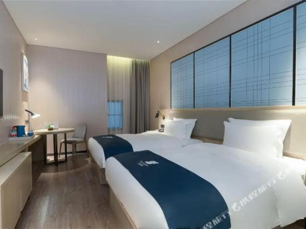 Bed in Echarm Hotel Nanning the MixC Exhibition Center Metro Station