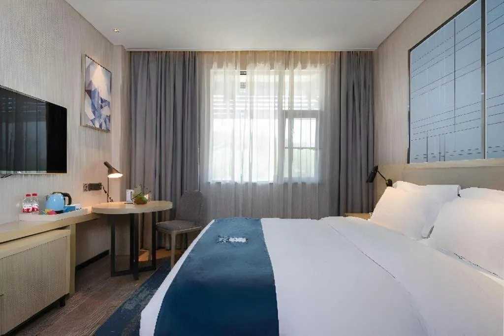 Bed in Echarm Hotel Nanning the MixC Exhibition Center Metro Station