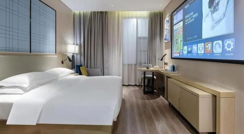 Bed in Echarm Hotel Nanning the MixC Exhibition Center Metro Station