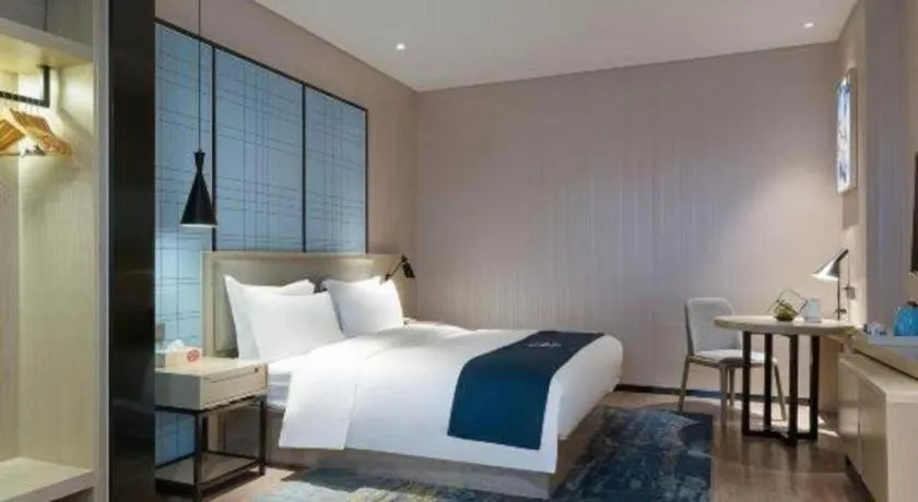 Bed in Echarm Hotel Nanning the MixC Exhibition Center Metro Station