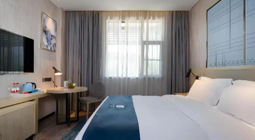 Bed in Echarm Hotel Nanning the MixC Exhibition Center Metro Station