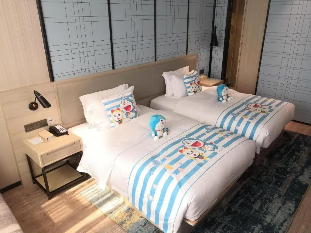 Bed in Echarm Hotel Nanning the MixC Exhibition Center Metro Station