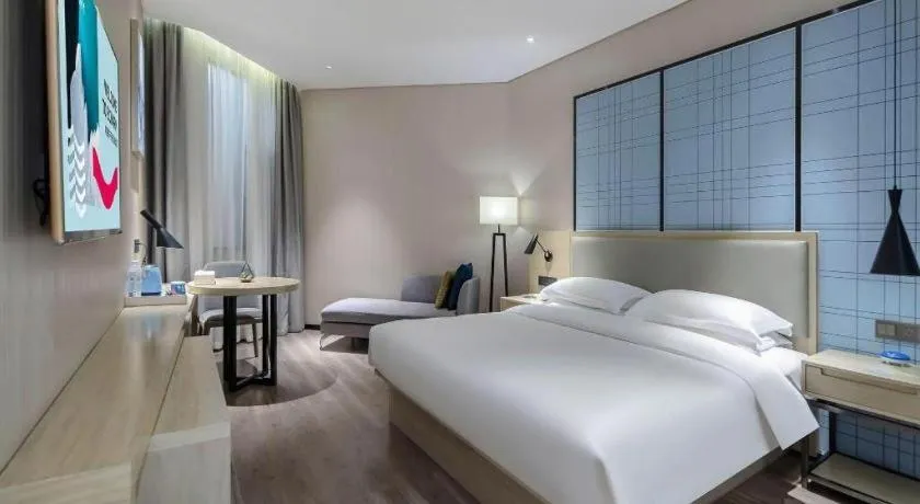 Bed in Echarm Hotel Nanning the MixC Exhibition Center Metro Station