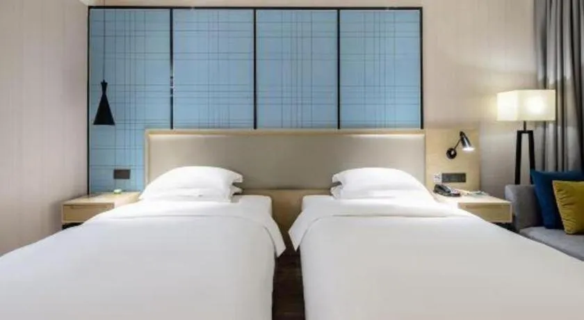 Bed in Echarm Hotel Nanning the MixC Exhibition Center Metro Station