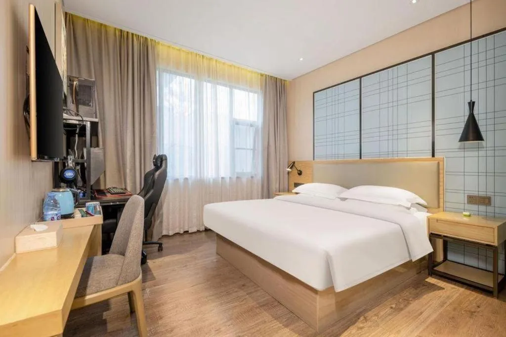 Bed in Echarm Hotel Nanning the MixC Exhibition Center Metro Station