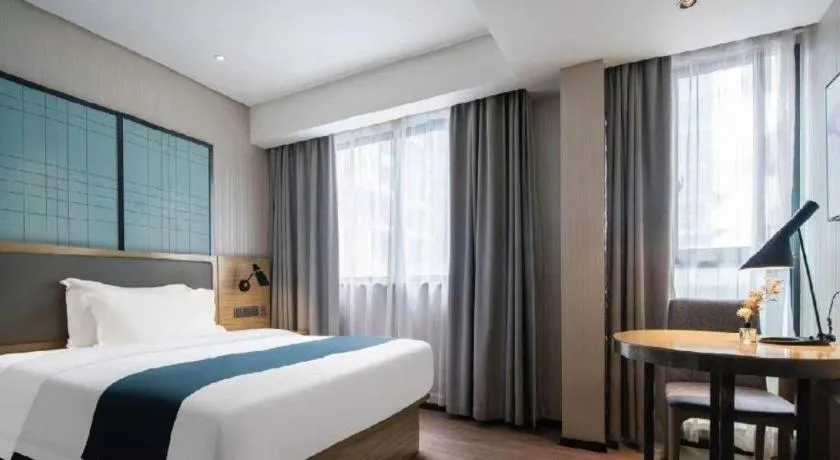 Bed in Echarm Hotel Nanning the MixC Exhibition Center Metro Station