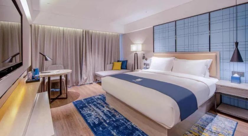 Bed in Echarm Hotel Nanning the MixC Exhibition Center Metro Station