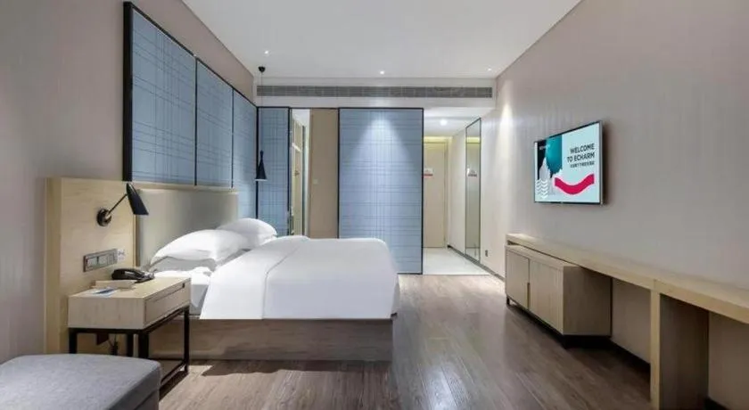 Bed in Echarm Hotel Nanning the MixC Exhibition Center Metro Station