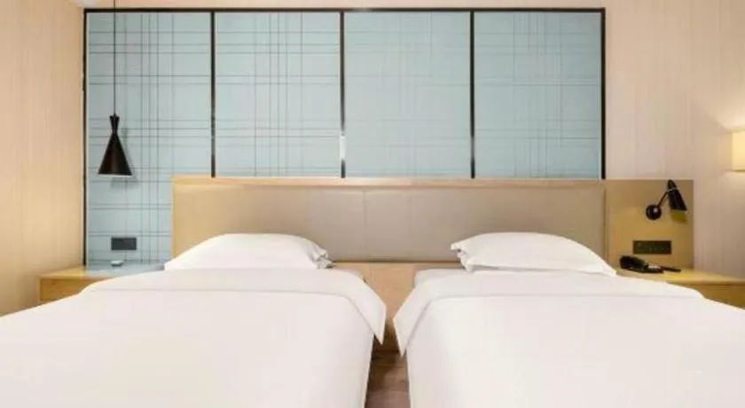 Bed in Echarm Hotel Nanning the MixC Exhibition Center Metro Station