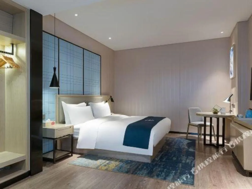 Bed in Echarm Hotel Nanning the MixC Exhibition Center Metro Station