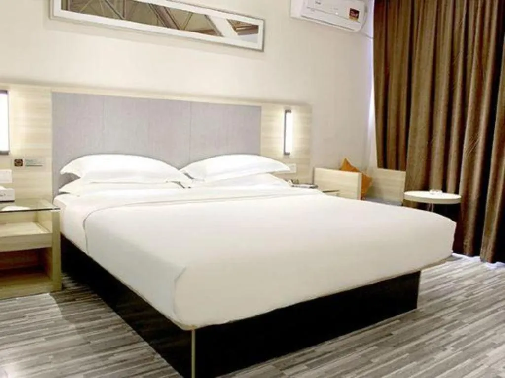 Bed in JTOUR Inn Yizhou Hechi College Pedestrian Street