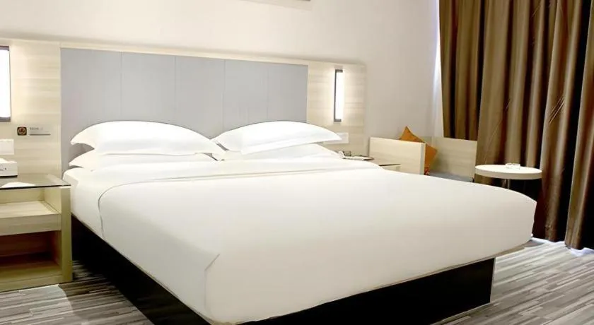 Bed in JTOUR Inn Yizhou Hechi College Pedestrian Street