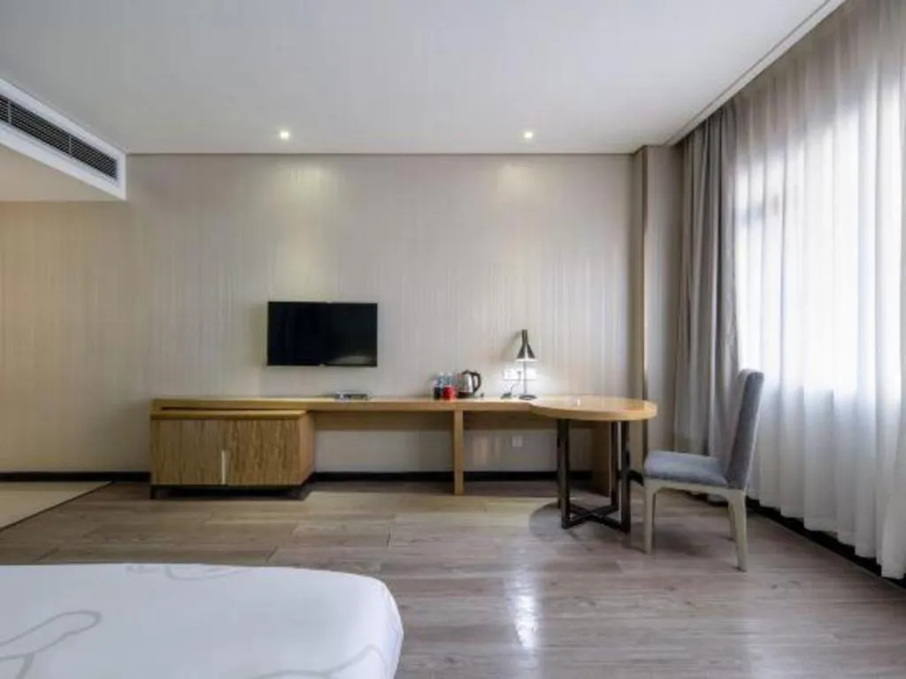 Bed in JTOUR Inn Yizhou Hechi College Pedestrian Street