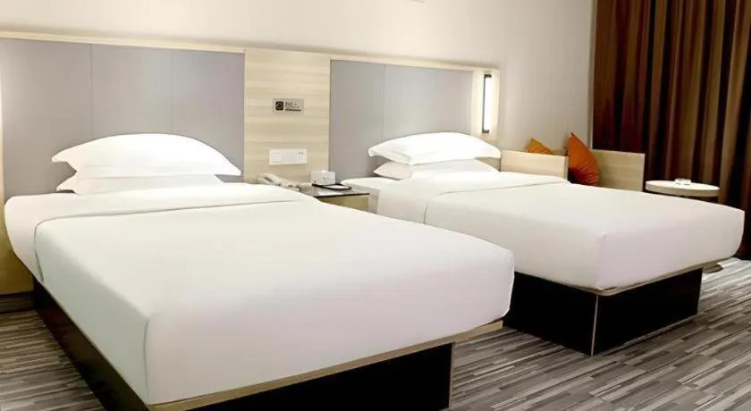 Bed in JTOUR Inn Yizhou Hechi College Pedestrian Street