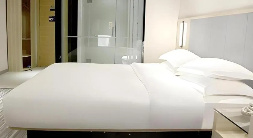Bed in JTOUR Inn Yizhou Hechi College Pedestrian Street
