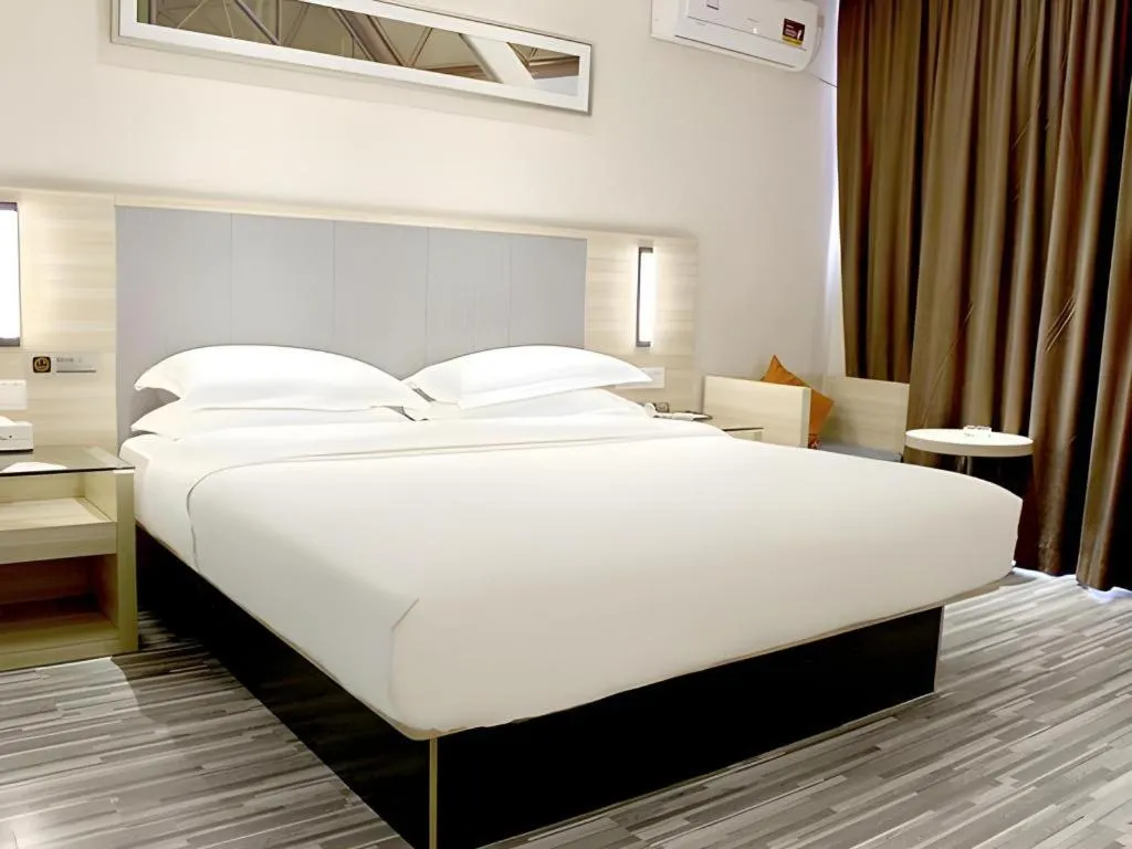 Bed in JTOUR Inn Yizhou Hechi College Pedestrian Street