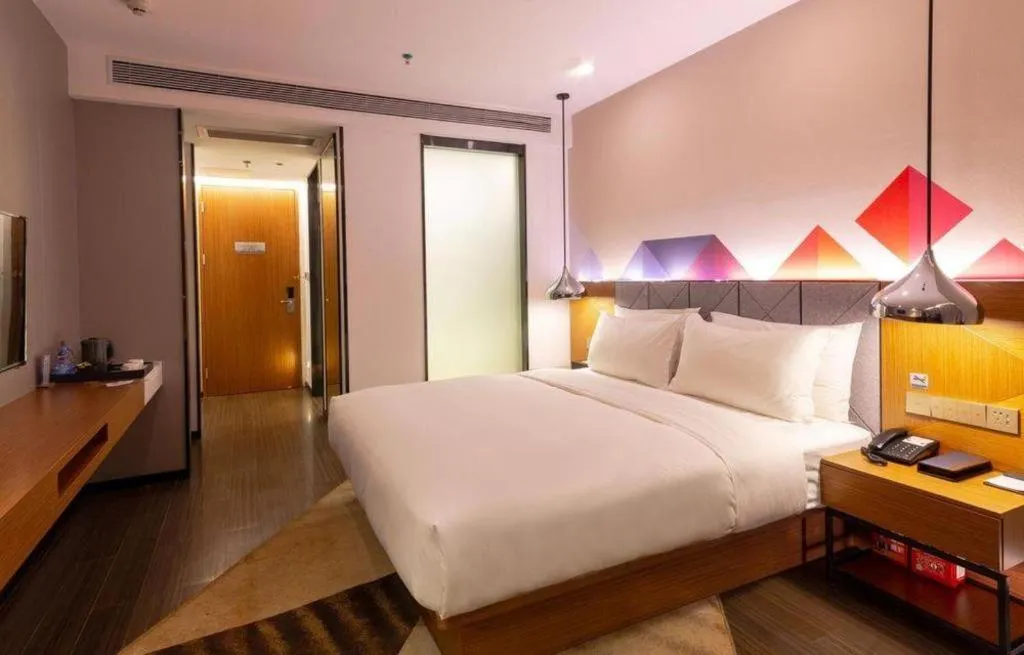 Bed in Borrman Hotel Zhanjiang Xuwen Port Terminal