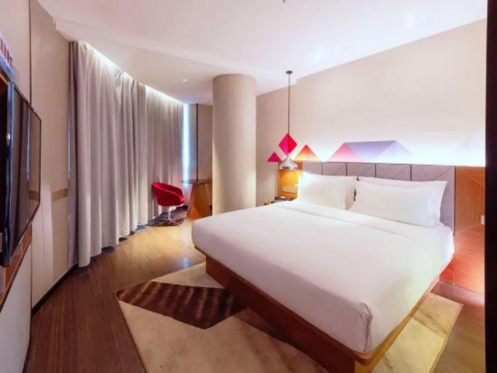 Bed in Borrman Hotel Zhanjiang Xuwen Port Terminal