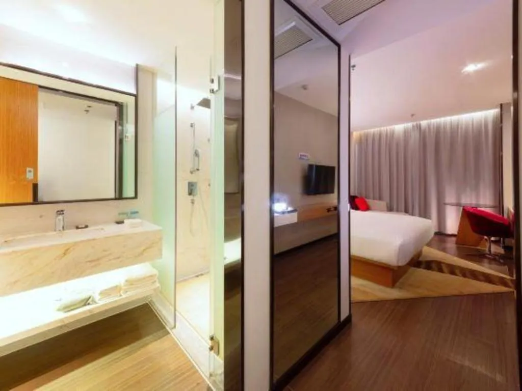 Bed in Borrman Hotel Zhanjiang Xuwen Port Terminal