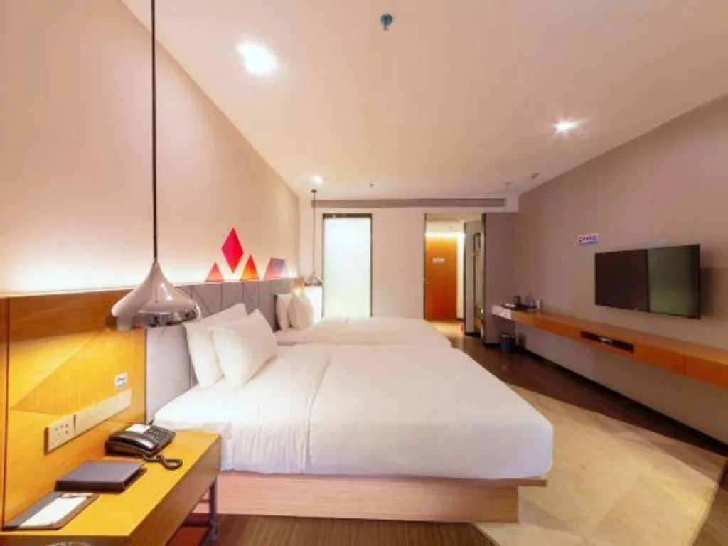 Bed in Borrman Hotel Zhanjiang Xuwen Port Terminal