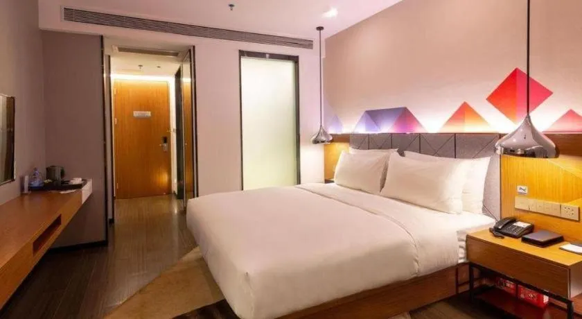 Bed in Borrman Hotel Zhanjiang Xuwen Port Terminal