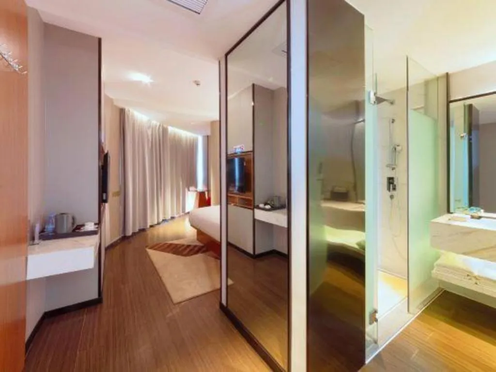 Bed in Borrman Hotel Zhanjiang Xuwen Port Terminal